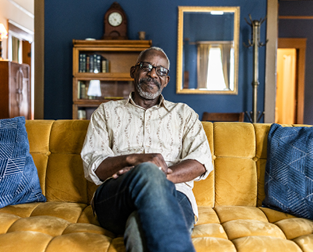 A man sitting on a couch