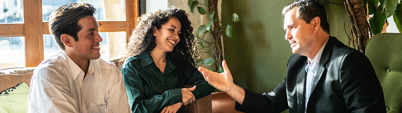 Couple talking to Merril Advisor