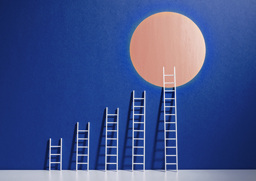 Ladders at various heights leaning against blue wall with tan circle